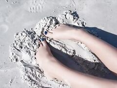 Sandy Teenage Feet at the Beach