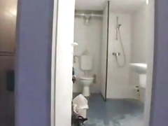 Mature BBW Cleaning Lady Does Two Guys in the Men's Room